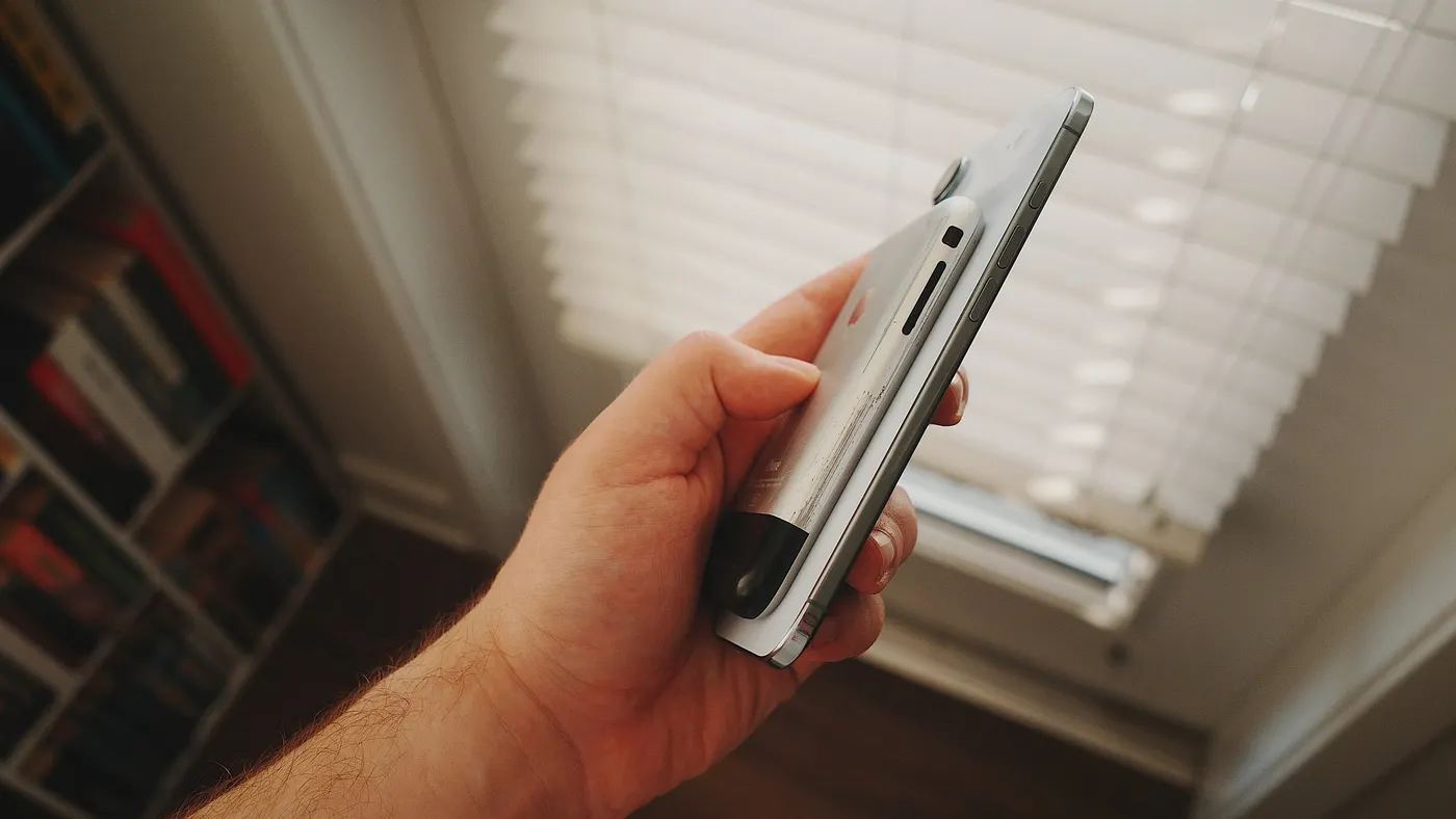 iPhone Air next to the original iPhone